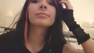 Emo girl with pierced nipples gets naked on webcam