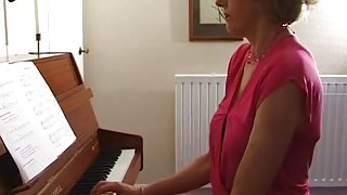 Uma at the piano