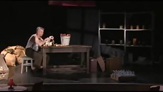 Public sex on a stage of a theatre as people watch
